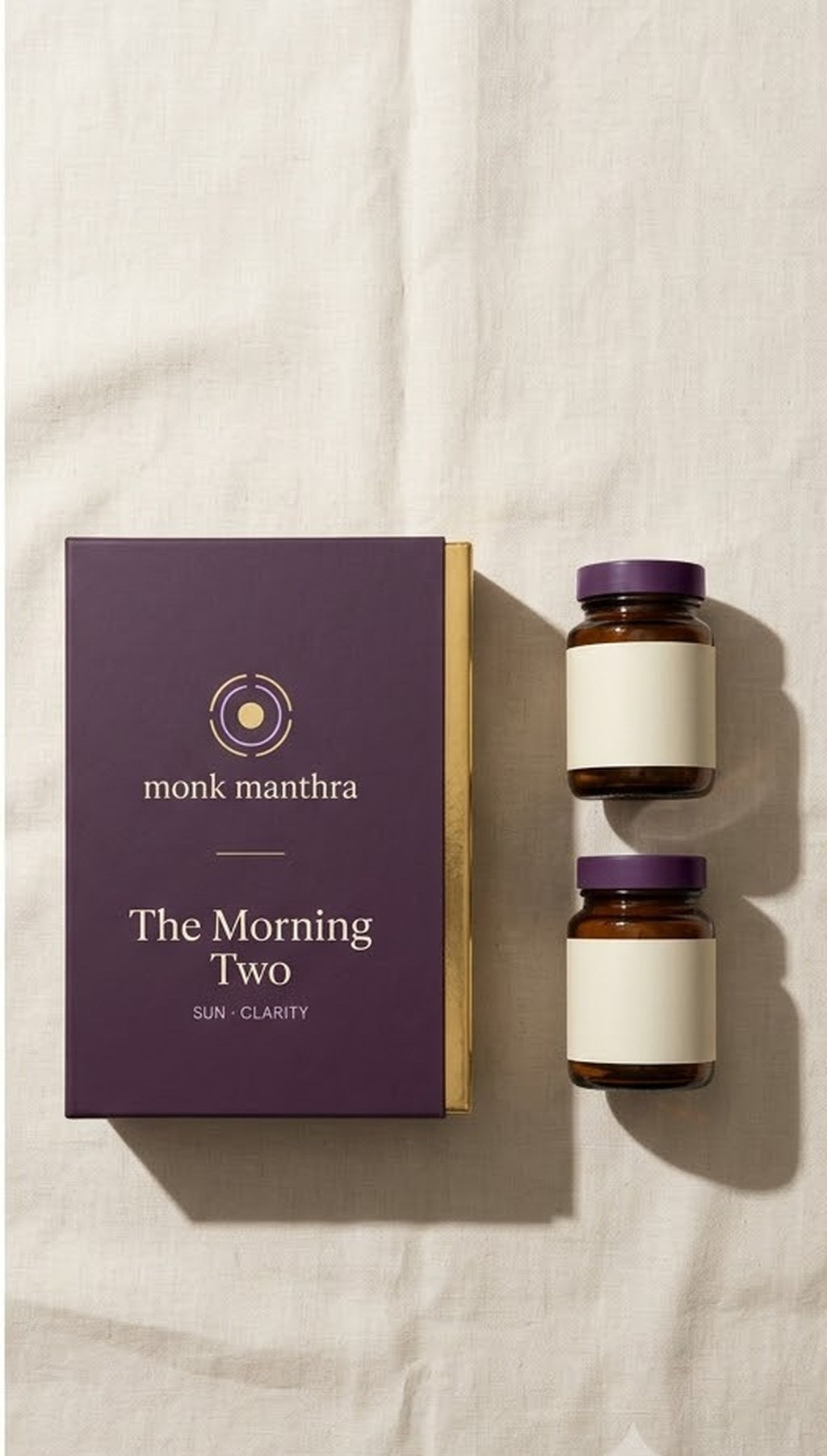 The Morning Two — gift carton with two amber jars, photographed overhead on linen
